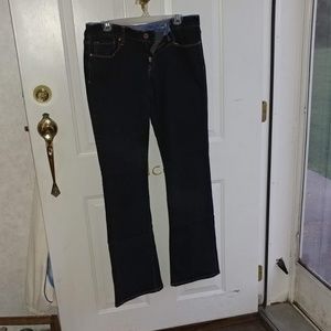 Dark navy blue boot legged jeans